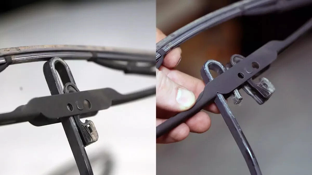 A motorist disconnects and removes the wiper blade from the wiper arm.