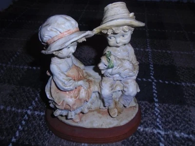 Vintage Style Ceramic Boy Girl Figurines Bench - Image 1 of 4