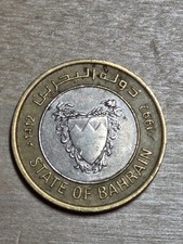 Bahrain 100 Fils coin, 1412 (1992). KM# 20, bi-metallic. Coat of arms.