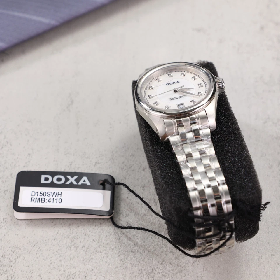 Reloj de cuarzo DOXA Damas Cara Blanca 12 Diamantes Rotos Impermeable D150SWH Foto 2 de 4