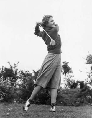Young talented golf player Fiona Morris during one of her typical - Old Photo
