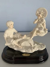 GUISEPPE ARMANI FIGURINE “ON THE SEE-SAW” 265F  6 1/2”x6” In Original Packaging