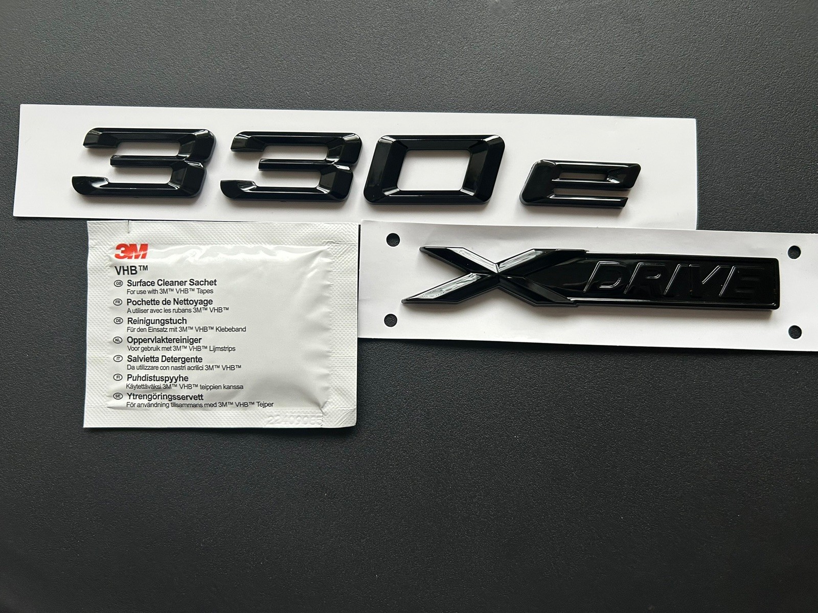 BMW 330e + Xdrive BADGE IN GLOSS BLACK. FREE ALCOHOL WIPE