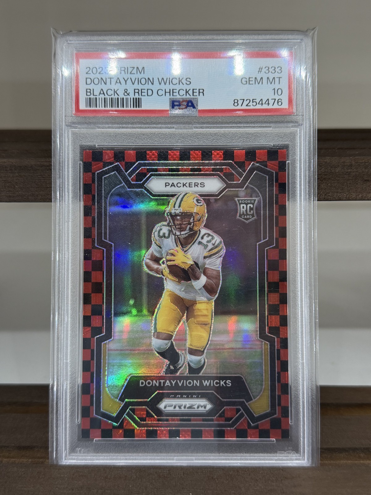 2023 Prizm #333 Dontayvion Wicks Black & Red Checker SSP PSA GEM MT 10
