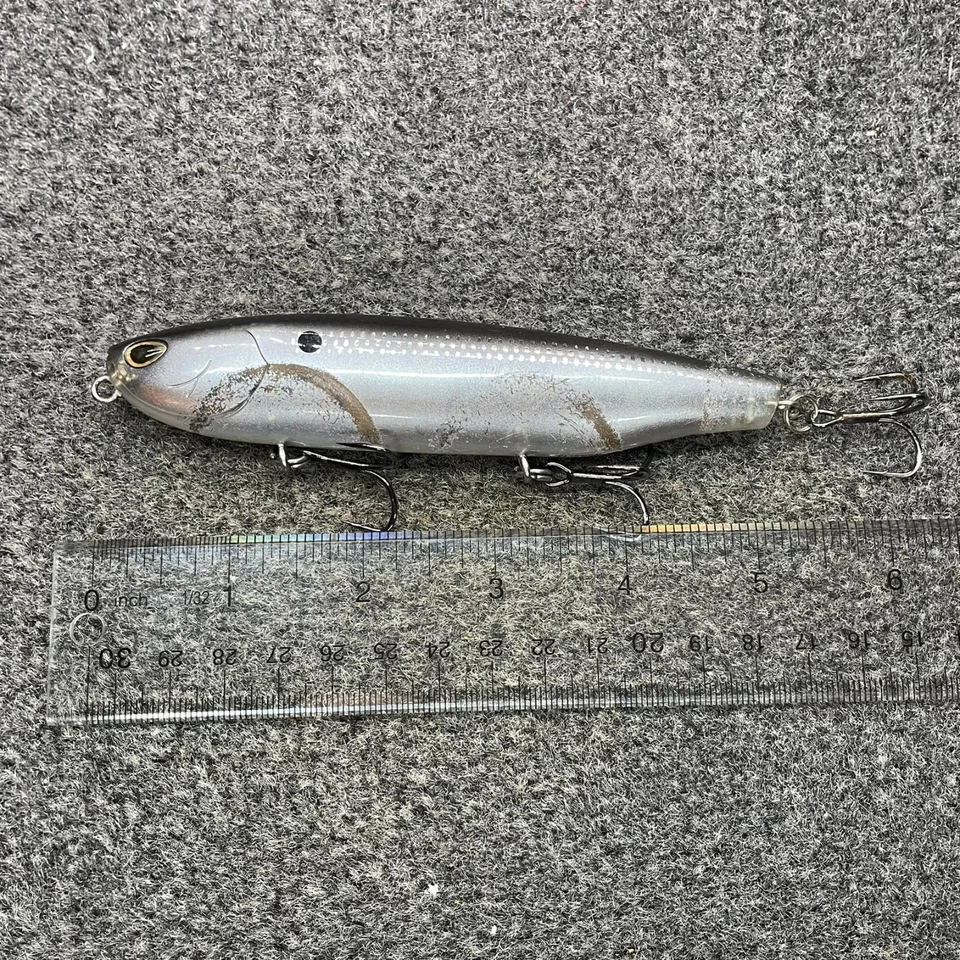 Señuelo para caminar Storm Arashi Top Walker 11 Topwater 3/4 oz 4,25" negro plata sábalo Foto 2 de 4