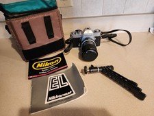 Nikon Nikkormat EL 35mm Film Camera w/Nikon Nikkor 43-86mm f3.5 Lens, Book