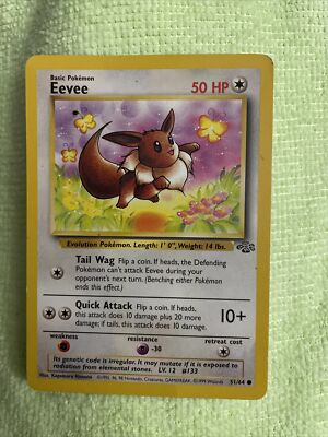 1999 eevee pokemon card Eevee Pokemon Team Rocket 1st Edition #55 PSA 8 #1 main image 1