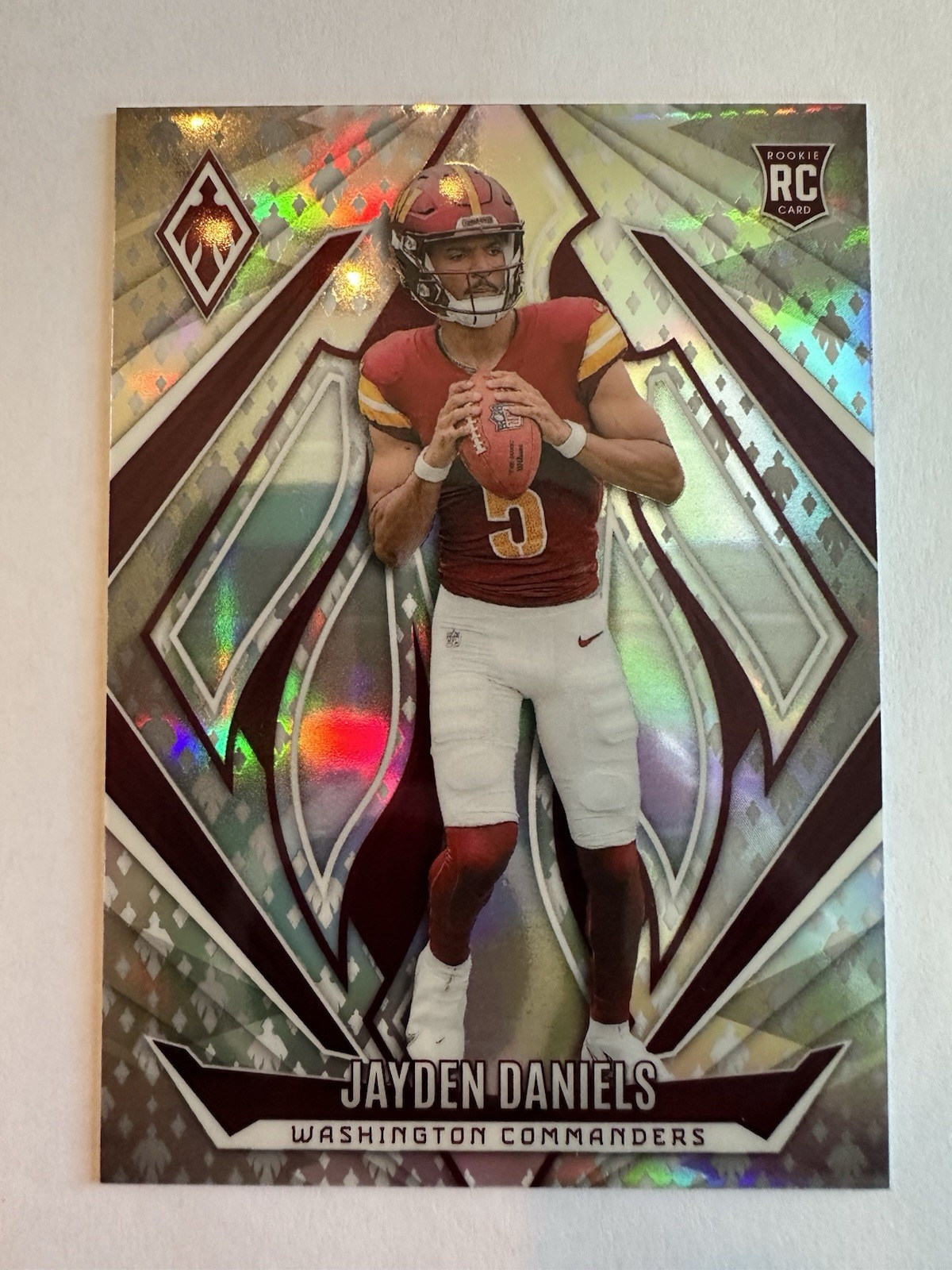 2024 Panini Phoenix Jayden Daniels #198 Silver Holo /399 Rookie RC Commanders 🔥