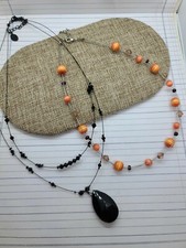 Lot Of 2 Claire's Necklaces. So pretty. Orange necklace missing the Claire's tag