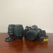Nikon D3100 camera with 3 lenses. Great condition