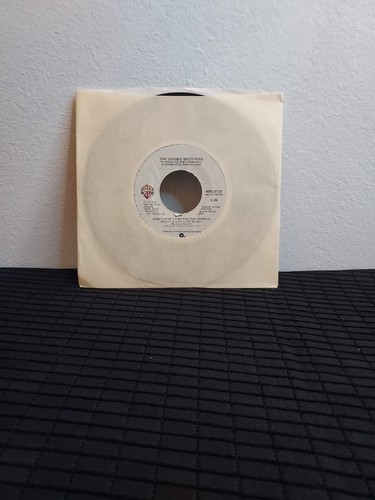 The Doobie Brothers~What A Fool Believes & Don'T Stop To Watch The Wheels 7" LP - Picture 2 of 4
