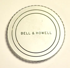Bell & Howell heavy metal front lens cap with 44mm thread.