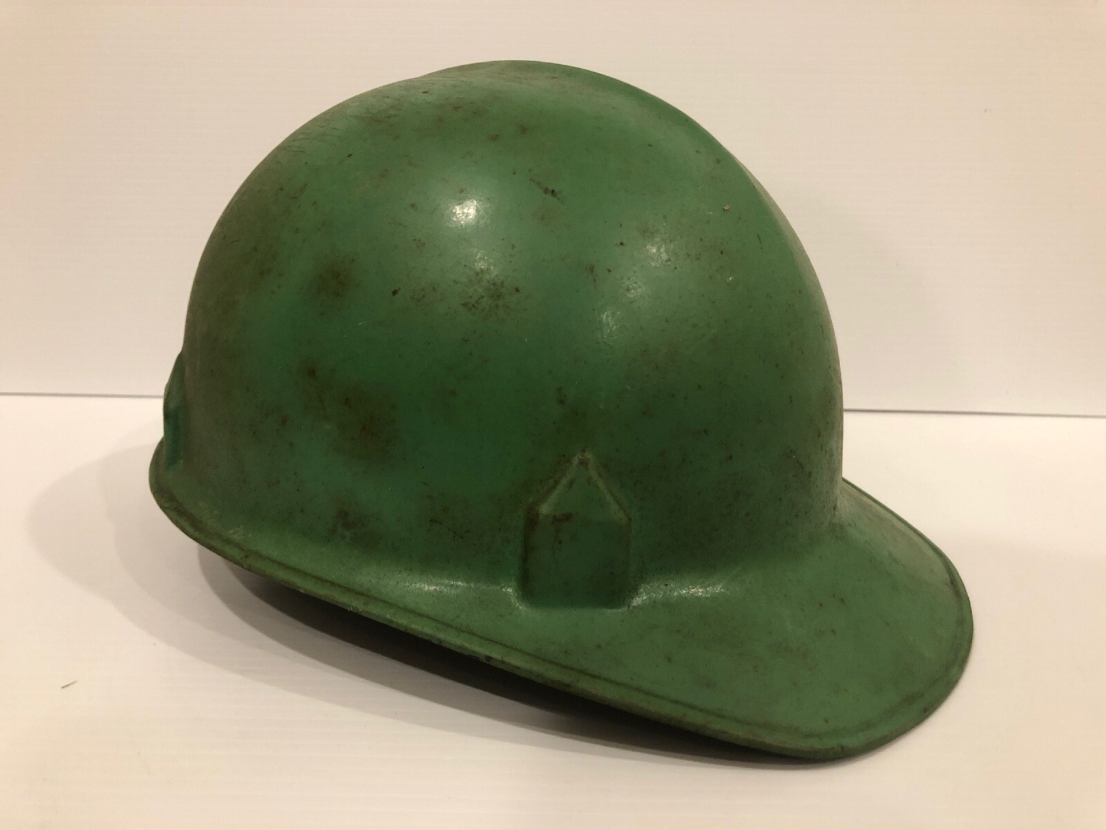 green fiberglass hard hat