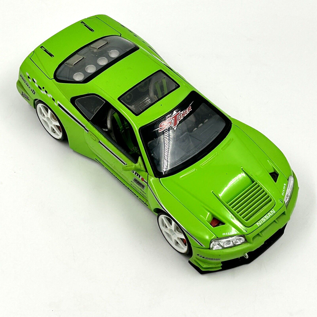 muscle machine Nissan Skyline GT-R ミニカー Muscle Machines SS Tuner 2000 Nissan Skyline GTR 1/18 Orange