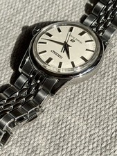 Grand Seiko SBGW005 - B&P, Cream Dial, Blued Second Hand, Beads of Rice Bracelet 9