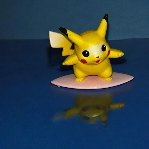 Vintage TOMY Pokemon PIKACHU on SURFBOARD 2" Mini Figure CGTSJ Nintendo Toy