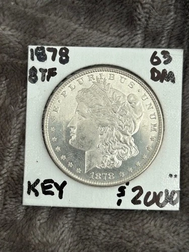 PL 1878 8TF MORGAN DOLLAR, GUARANTEED UNCIRCULATED. Beautifully Mirrored.