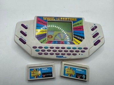Tiger Electronics Wheel of Fortune Handheld Electronic game for parts or repair