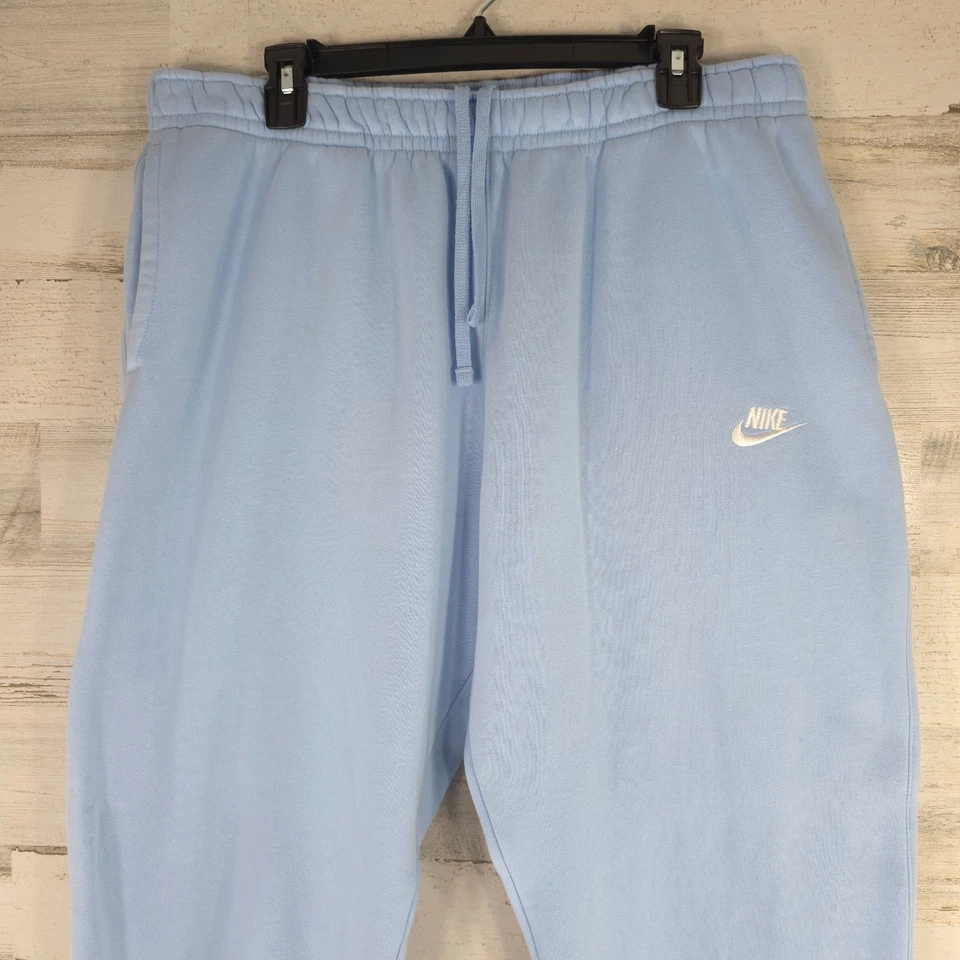 PANTALONES JOGGER NIKE AZUL CLARO POLAR PARA MUJER Talla XL BOLSILLOS CON CORDÓN pequeña mancha Foto 4 de 4