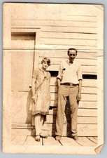 Vtg Snapshot Young Couple Standing By House 1920s