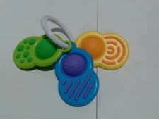 UsedLikeNew_Fat Brain Toys Dimpl Clutch, Popping Sensory Take-Along B_Blue,green