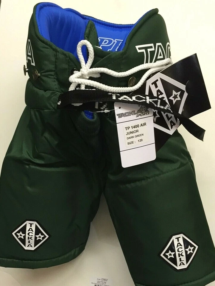 Pantalones de hockey sobre hielo verde oscuro con etiquetas de Tackla Foto 2 de 4