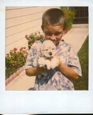 Old Vintage Photo COLOR POLAROID SOLO BOY HOLDING PUPPY DOG INSTANT PHOTOGRAPH