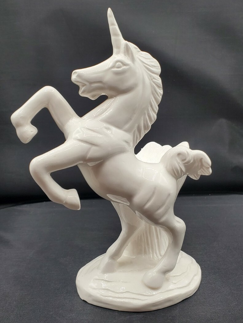 White Luster Rearing On Back Legs Flower Ceramic