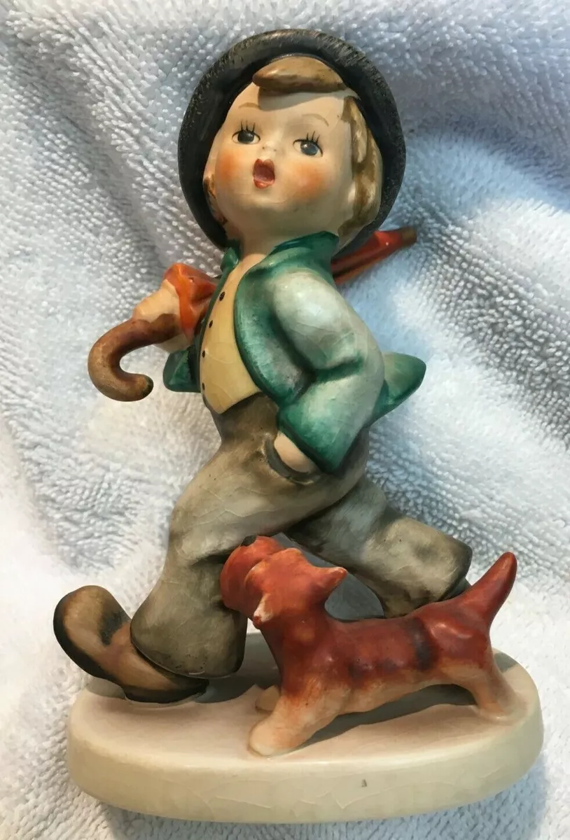Hummel boy with umbrella on sale and dog