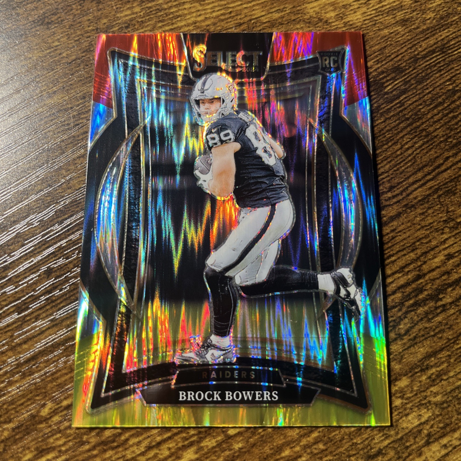 2024 Panini Select - Concourse Brock Bowers #31 Red & Yellow Shock Prizm (RC)