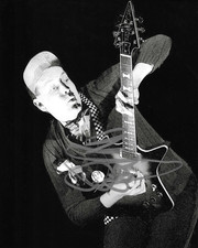 * RICK NIELSEN * signed 8x10 photo * CHEAP TRICK * COA *