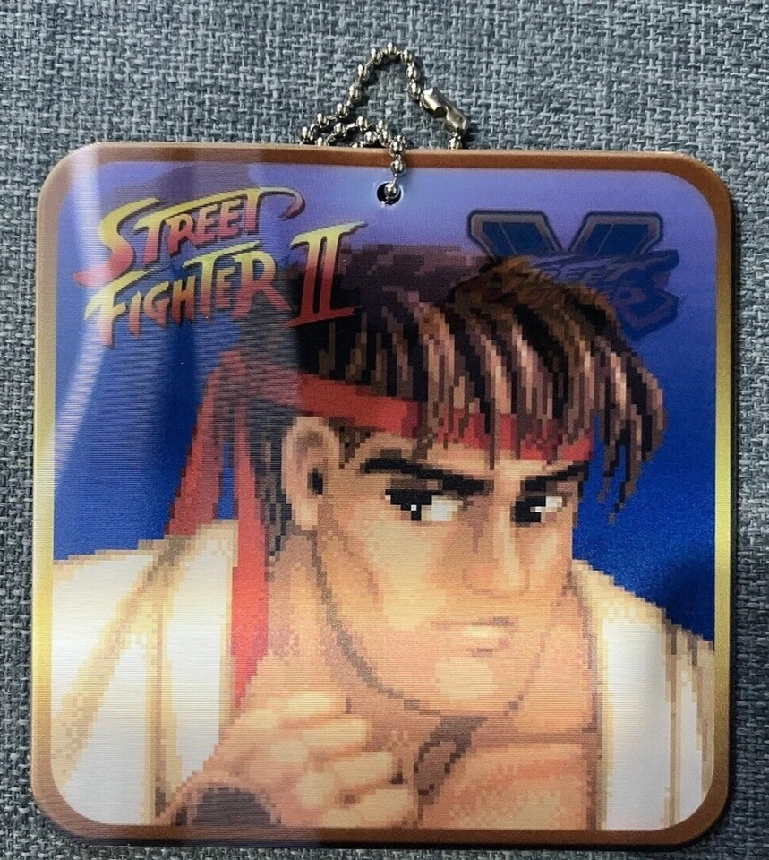 Street Fighter V Holographic / Lenticular Changing Keychain, promotional merch - Image 2 of 3