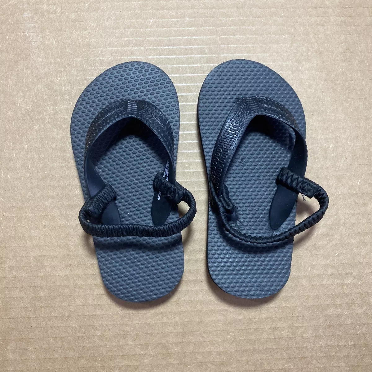 Black toddler flip flops hotsell