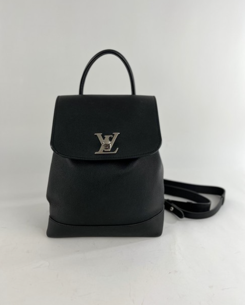 Authentic Louis Vuitton Leather Lockme MM Backpack in Black M51136