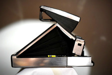 Polaroid SX-70 Instant Film Land Camera Brown. Sold as is. See pictures  info.