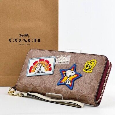 【COACH X PEANUTS】ロング ジップアラウンド ウォレット パッチ COACH x PEANUTS Long Zip Around Wallet In Signature Canvas
