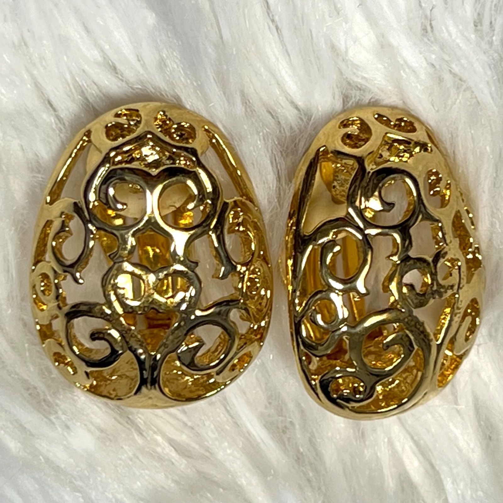 Orecchini Yves Saint Laurent vintage oro motivo arabesco