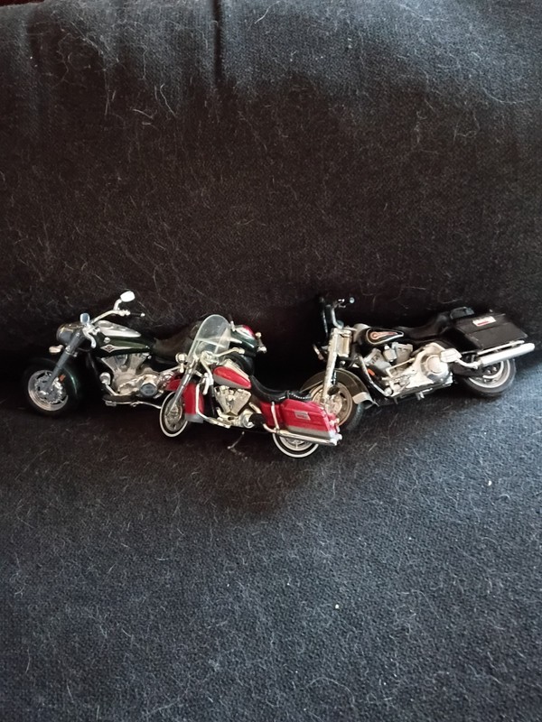 Harley Davidson 2 Die Cast Motorcycles. 1 Kawasaki Vulcan Motorcycle.
