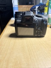 Canon EOS Rebel T7 DSLR Camera 24.1MP 18-55mm with Battery, Charger, and Bag