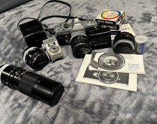 Canon FTb 35mm SLR Camera Lot FD 50mm 1.4 28mm 100-200mm Booster Filters