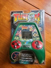 TUROK LCD Handheld Electronic Video Game 1998 Playmates Brand New Collectible