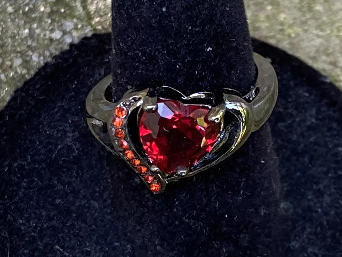 Black gold 2024 ruby engagement rings