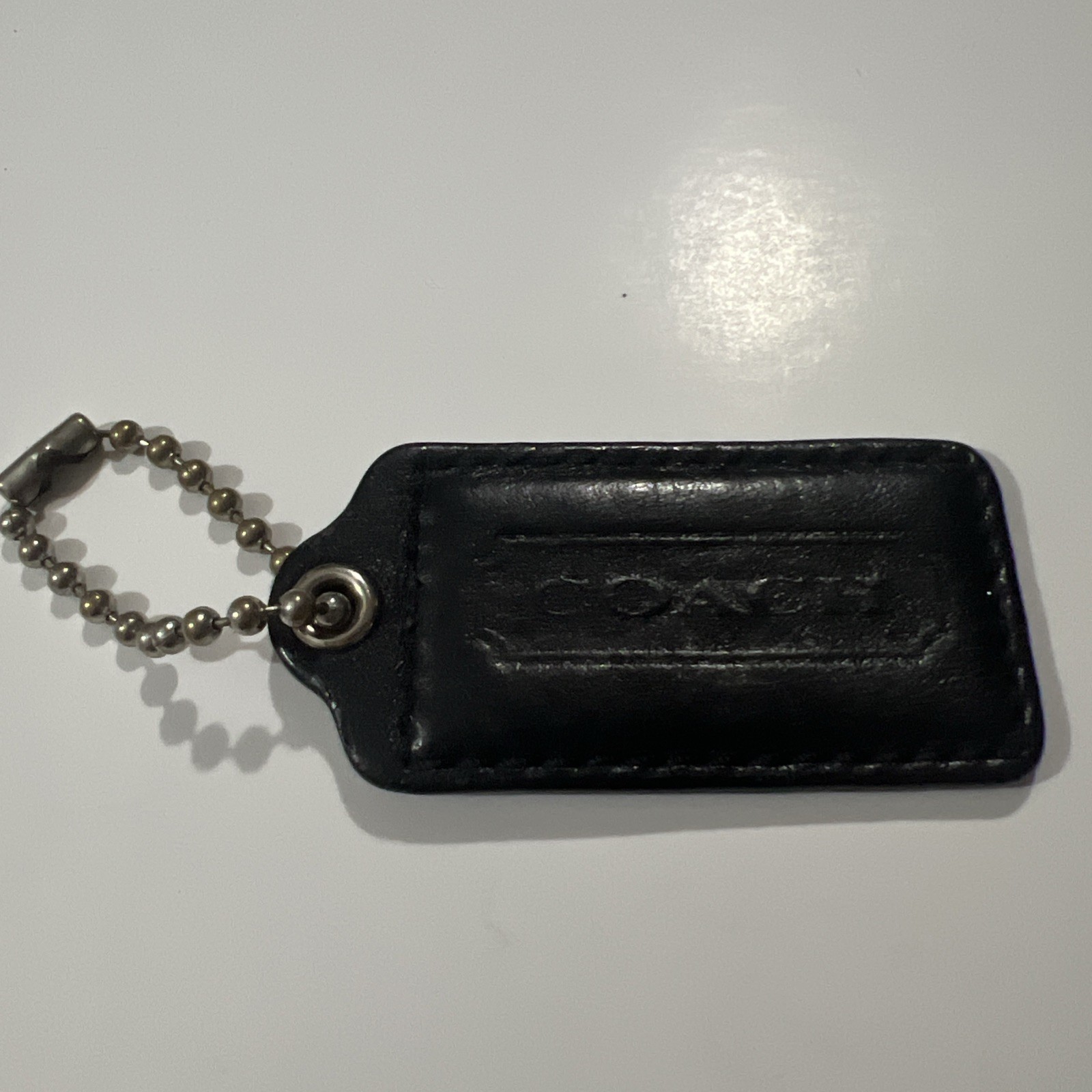 COACH Leather Black Bag Charm with Chain