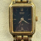 Vintage Women's Seiko Watch V401-5121 RO Black Dial Gold Tone Tank Style