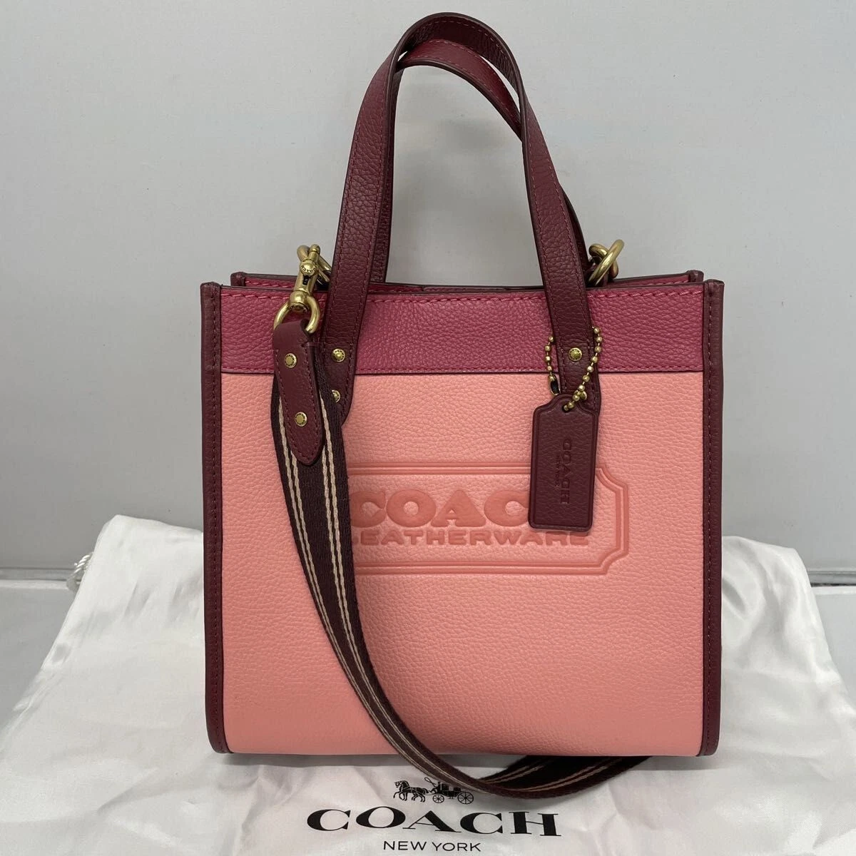 Coach field tote 22 colorblock with coach badge in brass/ pink