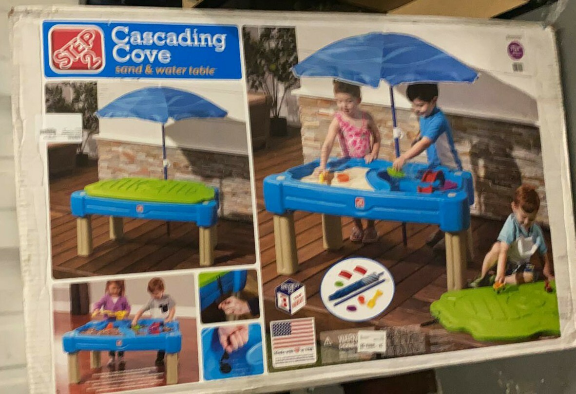 step2 cascading cove sand and water table with cover and umbrella