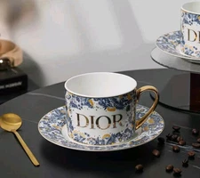 Dior Single Cup And Saucer Set With Blue Flowers And Gold Tone Handle. Gift Set