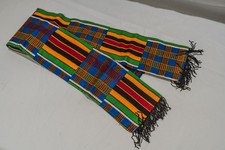 Multi-color African kente cloth scarf with fringes, typically made from cotton