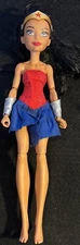 MATTEL 2015 Wonder Woman Brown BARBIE DOLL Fully ARTICULATED Red/Blue Skirt 11"