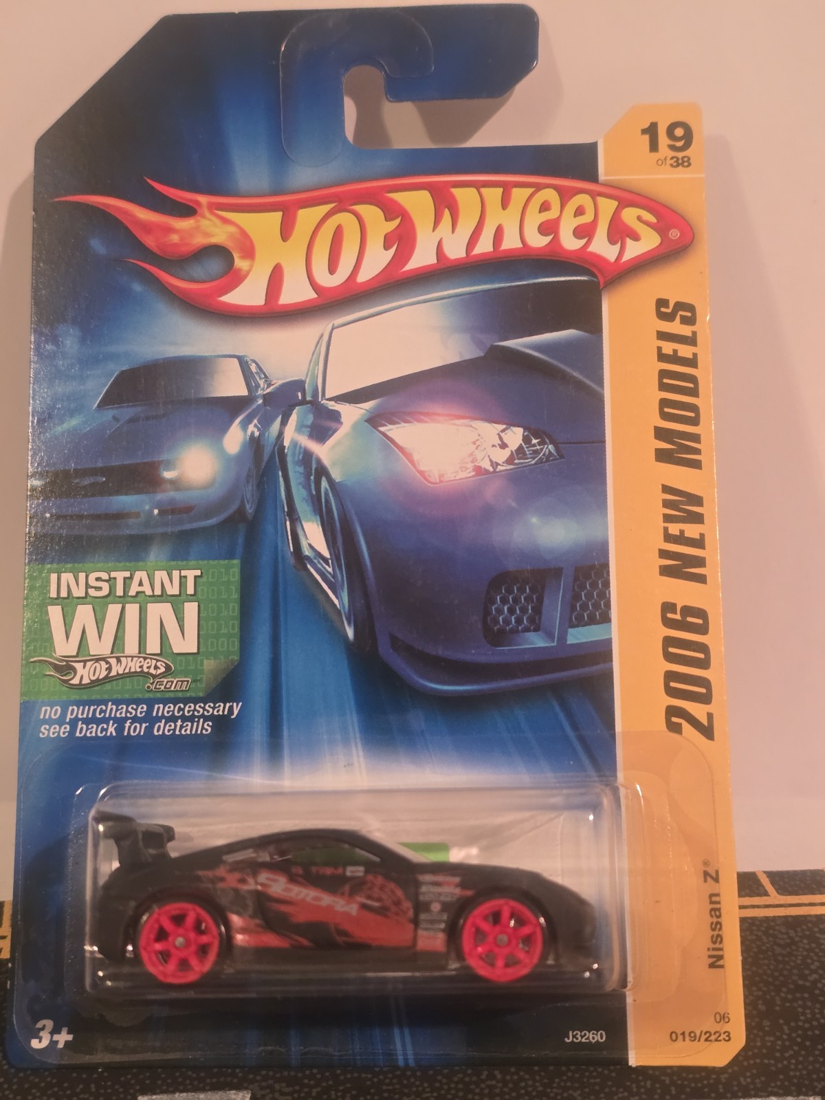 Hot Wheels 2006 New Models #19/38 Nissan Z in Black with Red CM6 Wheels